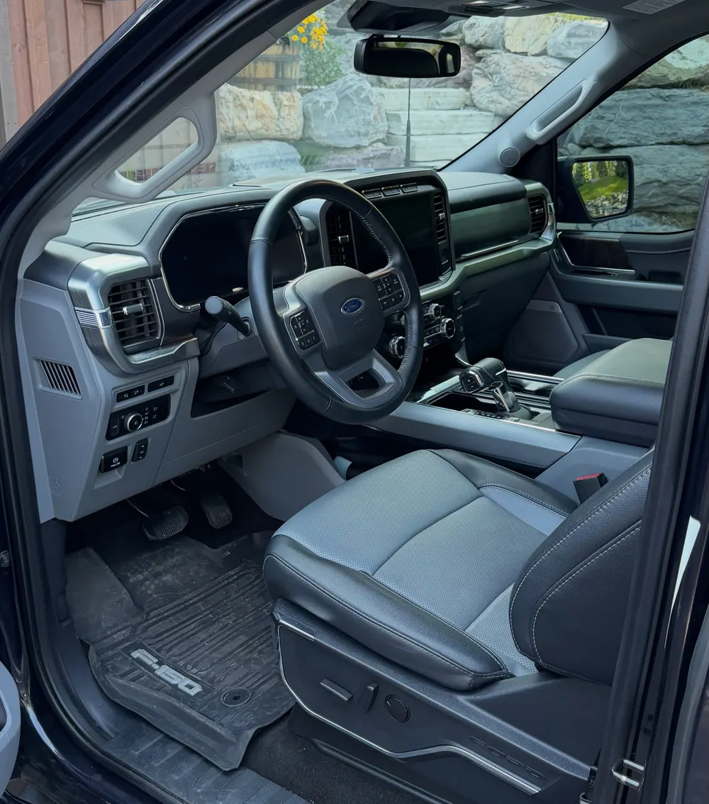 Ford F-150 interior with gray leather seats after a full detail