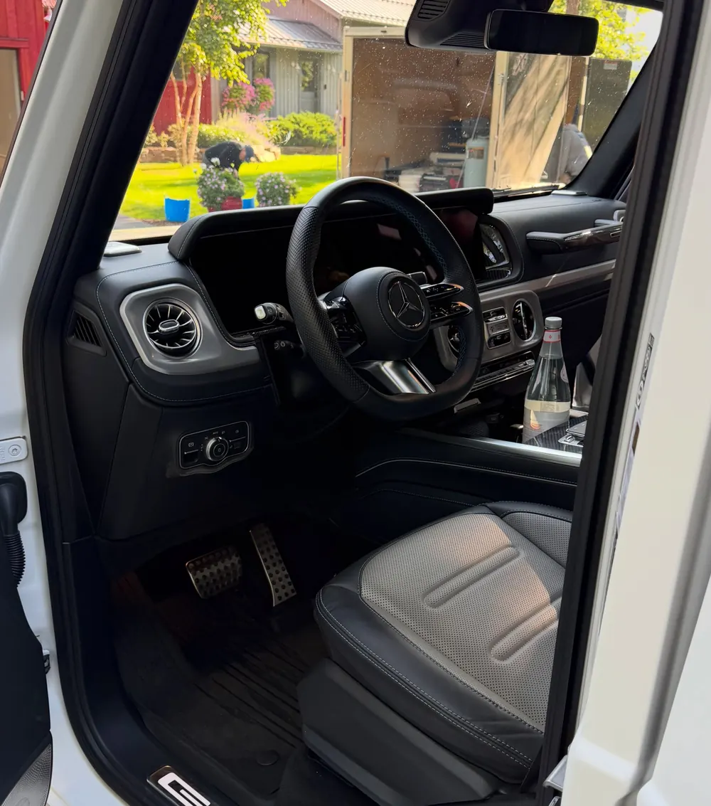 Mercedes G-Wagon interior with black leather after a monthly maintenance detail